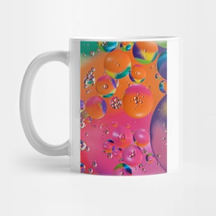 Colorful close up of oil drops in water Mug